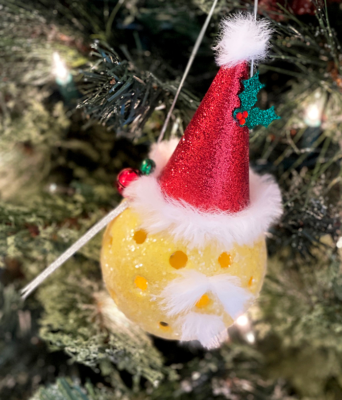 Santa Pickleball Ornament in a Christmas tree